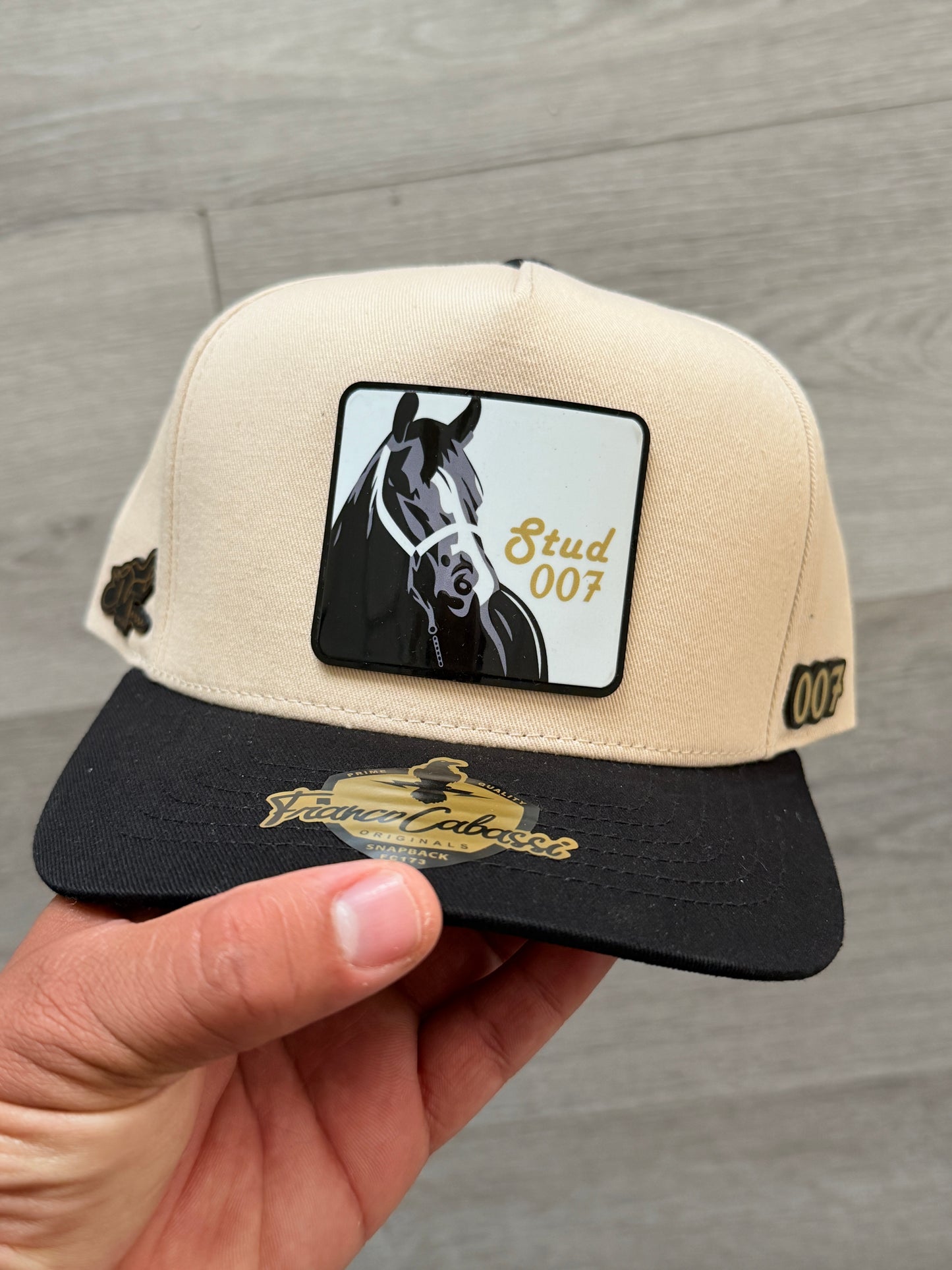 Beige original Stud007 with gold 007 emblem